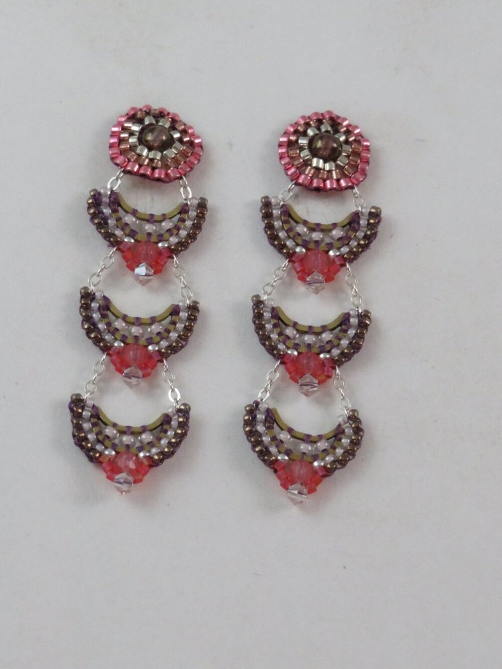 Handmade articulated crystal earrings purple